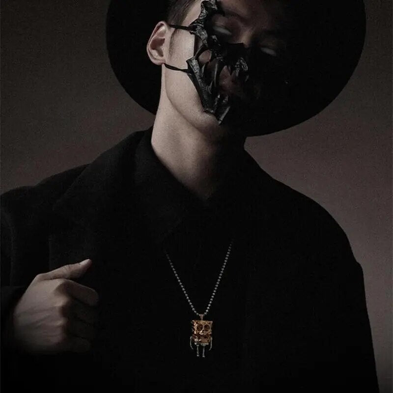 Quadbob -Schädelpuppe Halskette