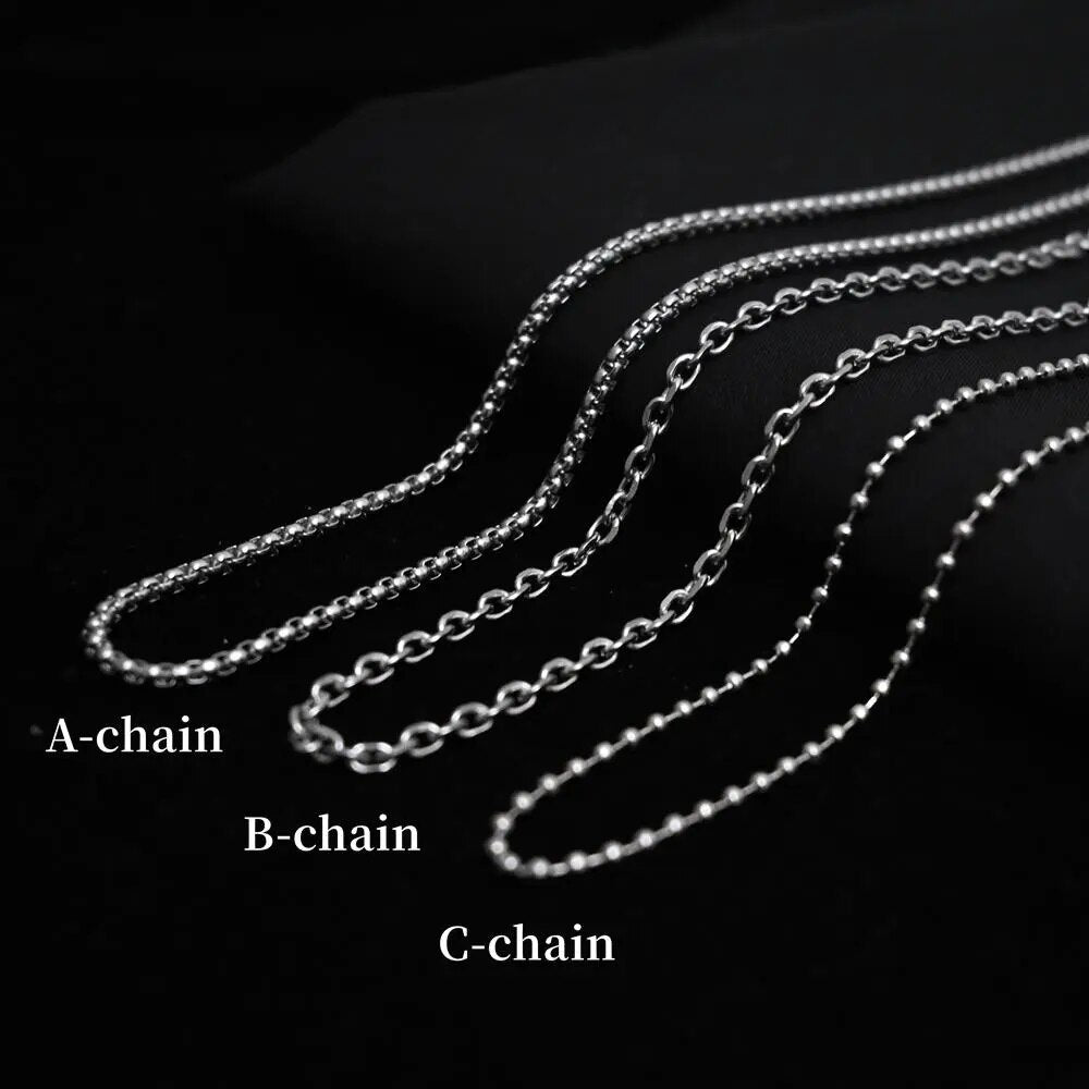 Quadbob -Schädelpuppe Halskette