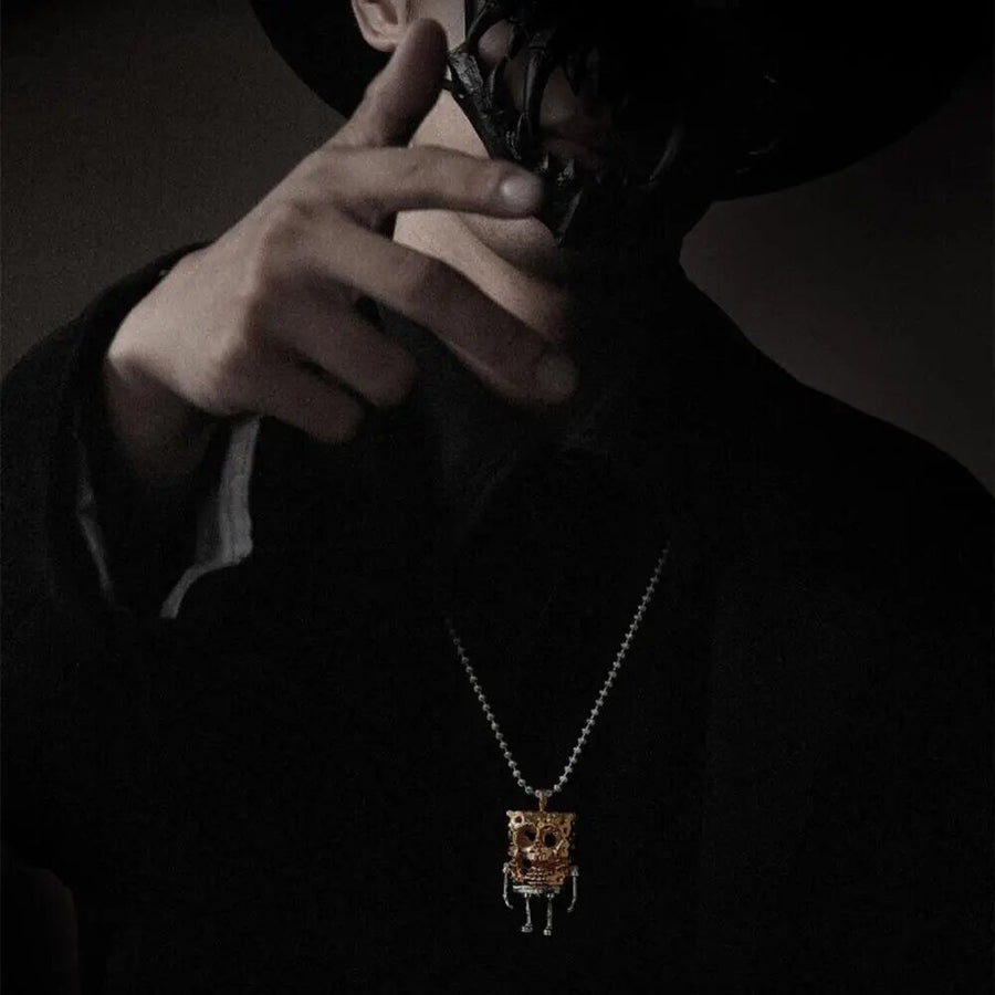 Quadbob skull doll necklace