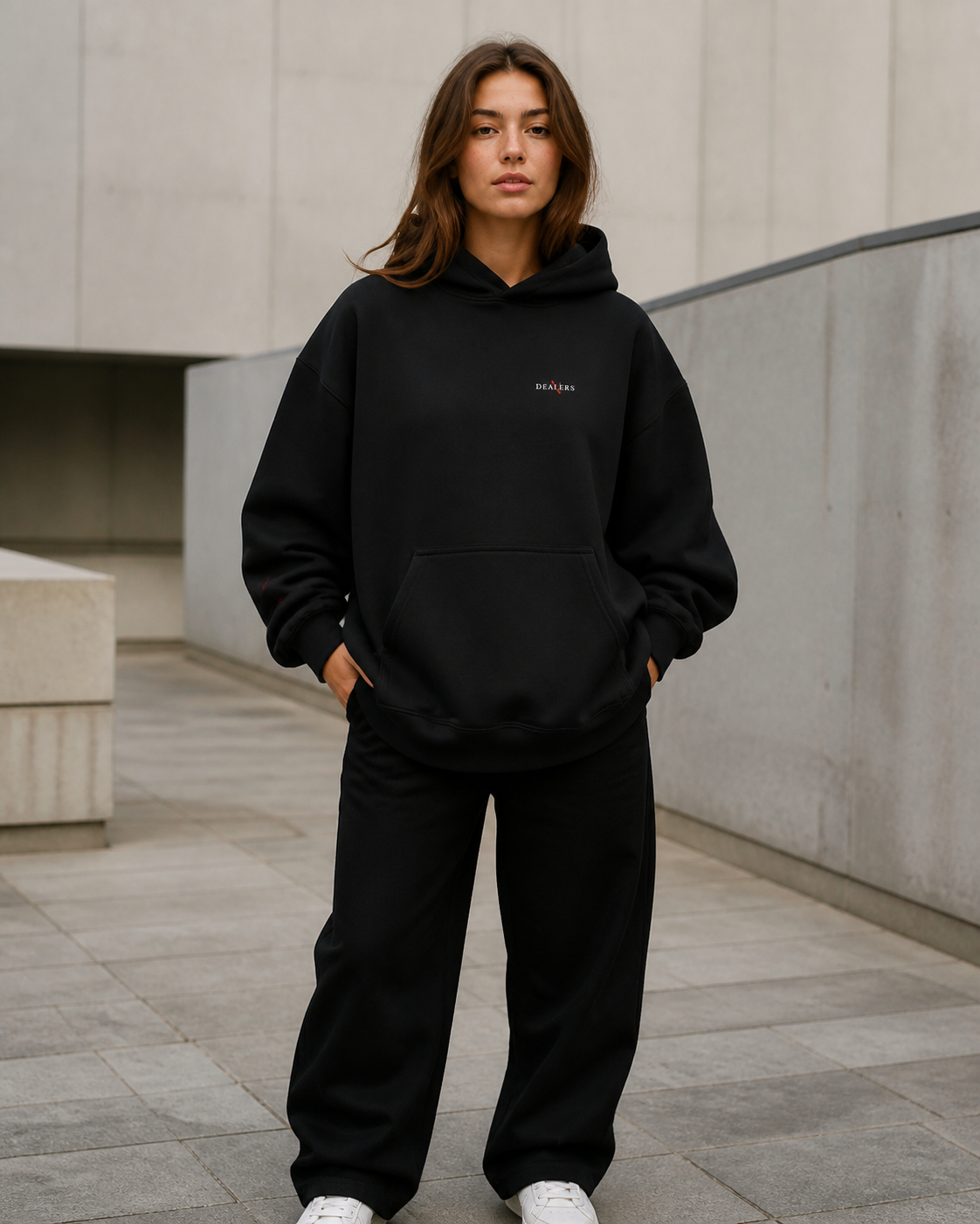 Blunt Dealers Hoodie in Schwarz an weiblichem Model, Vorderansicht – KI-generierte Darstellung