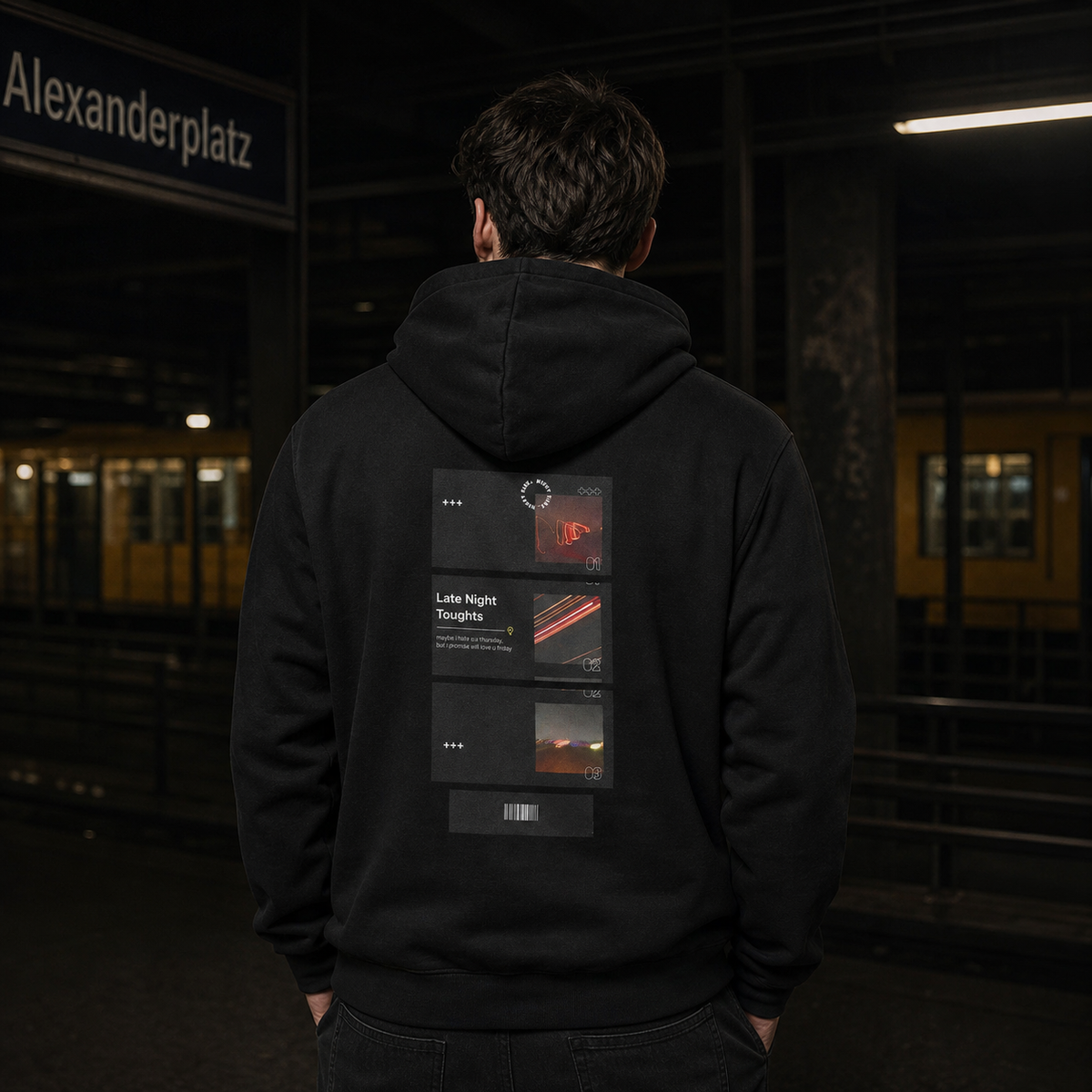 Männliches Model trägt den schwarzen Dreamers Graphic Hoodie von NiZED mit technischem Late Night Thoughts Rückenprint – KI-generierte Darstellung