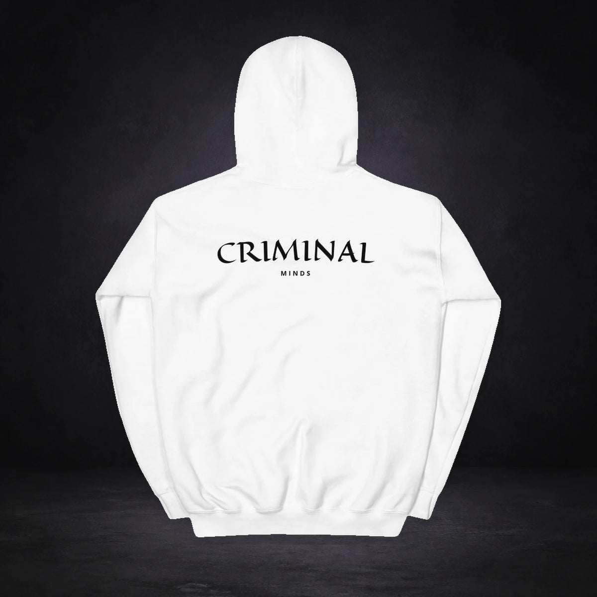 Criminal Minds Hoodie von NiZED, Rückansicht mit Designprint vor dunklem Betonhintergrund