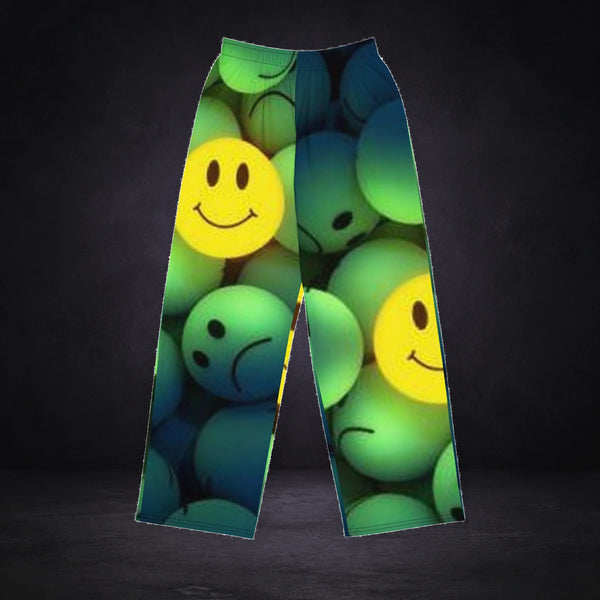 Glow Print Jogginghose von NiZED, Produktansicht mit Designprint vor dunklem Betonhintergrund