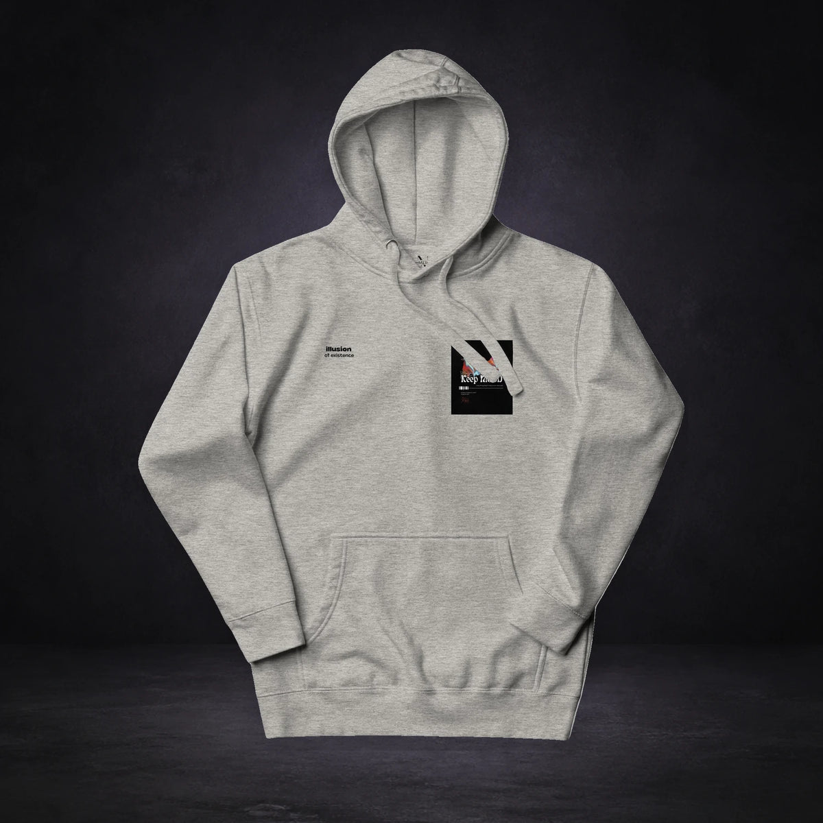 Illusion Existence Hoodie von NiZED, Vorderansicht mit Designprint vor dunklem Betonhintergrund