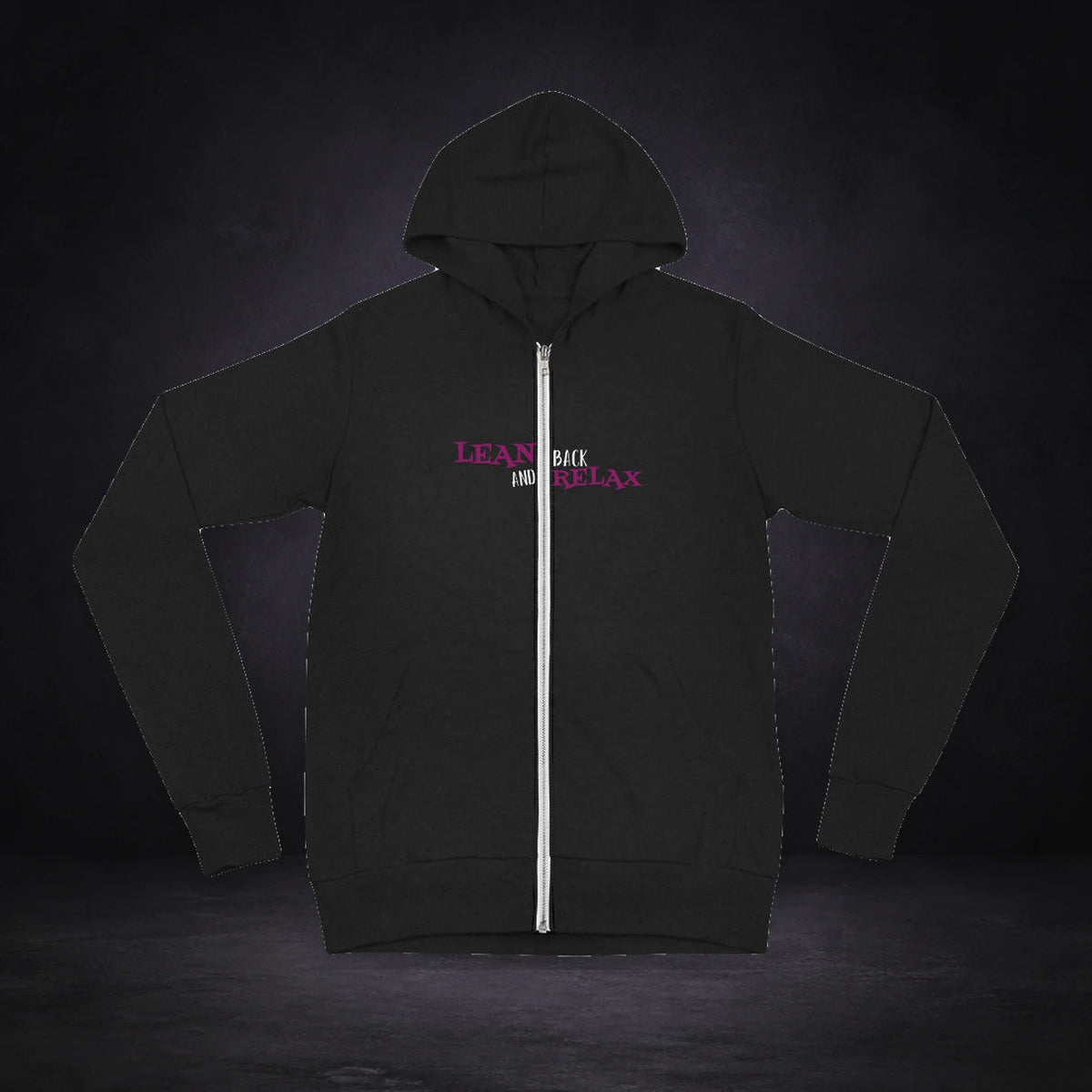 Lean Back Hoodie von NiZED, Vorderansicht mit Designprint vor dunklem Betonhintergrund