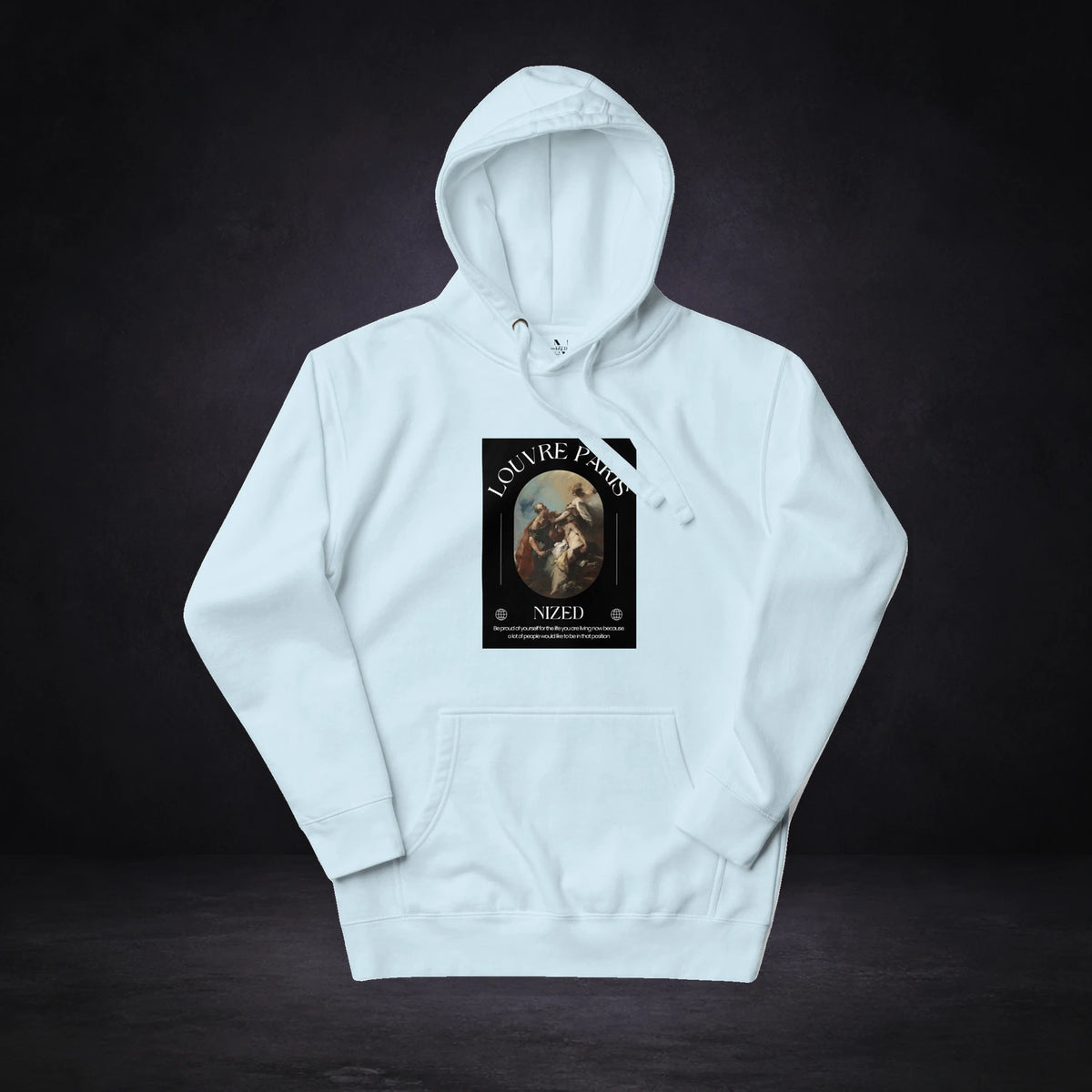 Louvre Paris Graphic Hoodie Design 2 von NiZED, Vorderansicht mit Designprint vor dunklem Betonhintergrund
