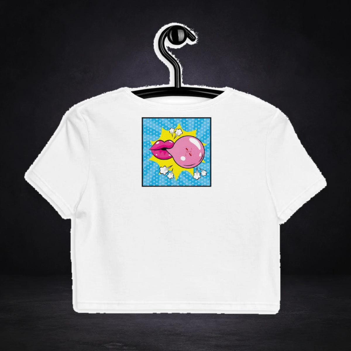 Bubble Crop Top von NiZED, Rückansicht mit Designprint vor dunklem Betonhintergrund