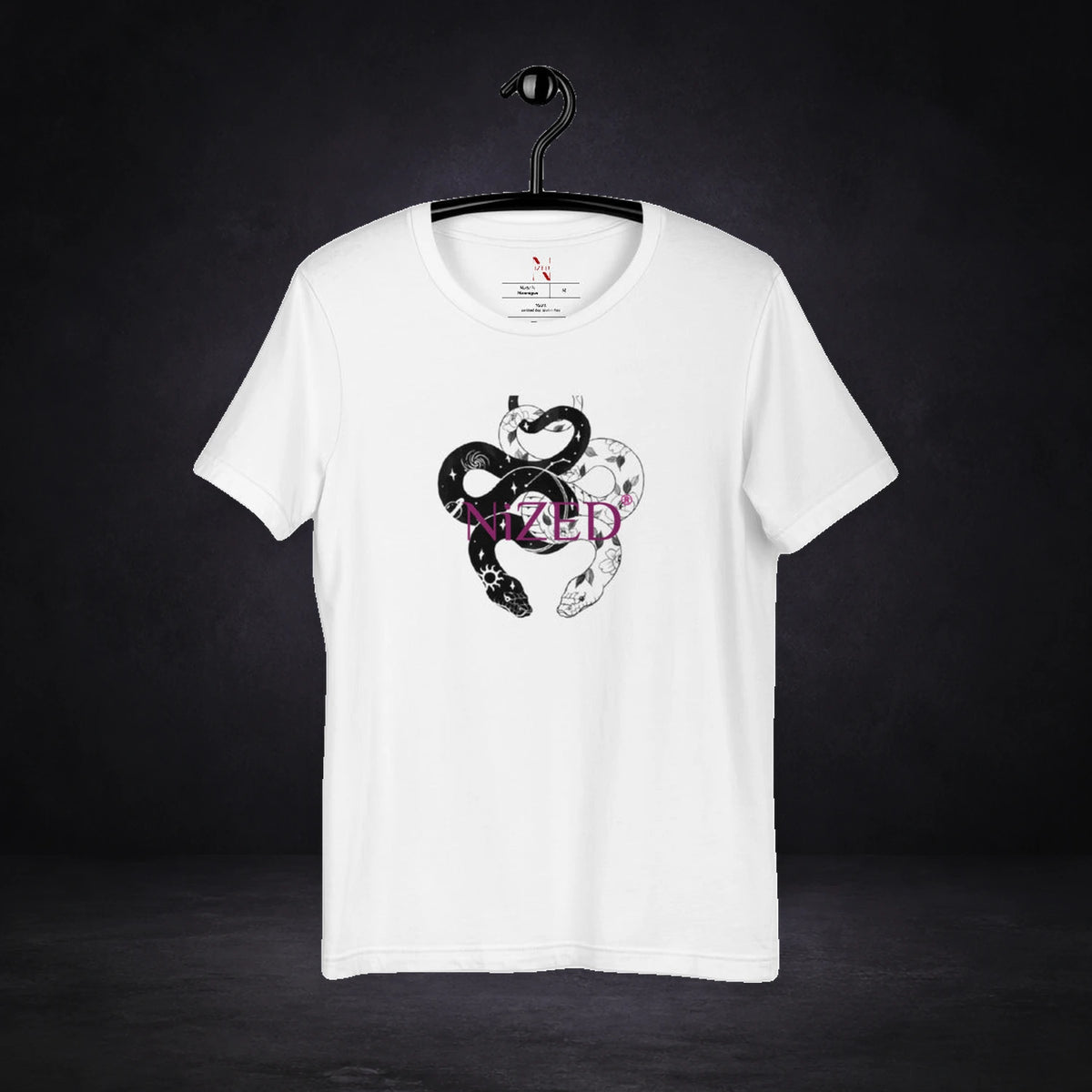 Snake Graphic T-Shirt von NiZED, Vorderansicht mit Designprint vor dunklem Betonhintergrund