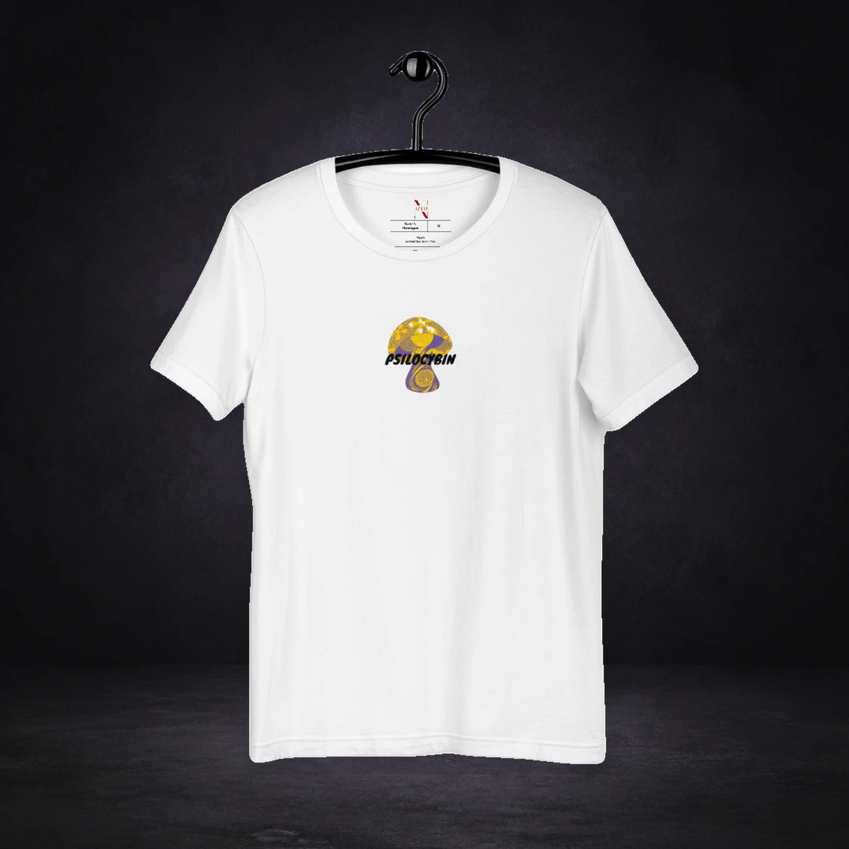 Psilocybin Graphic T-Shirt von NiZED, Vorderansicht mit Designprint vor dunklem Betonhintergrund