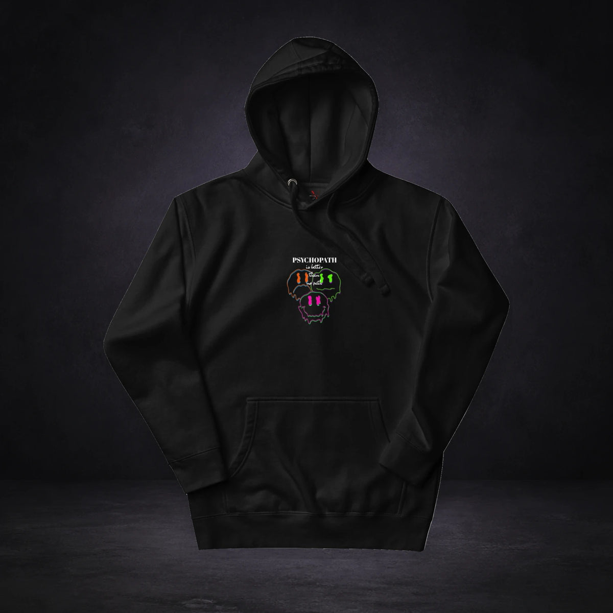 Psychopath Better Hoodie von NiZED, Vorderansicht mit Designprint vor dunklem Betonhintergrund