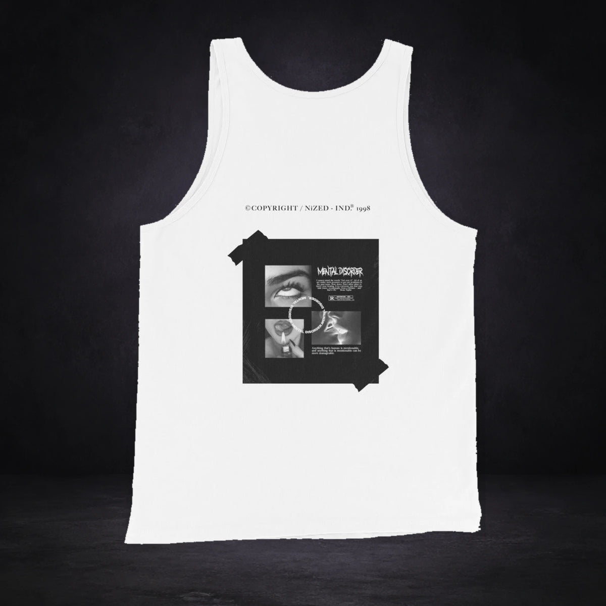 Reckless Tank Top von NiZED, Rückansicht mit Designprint vor dunklem Betonhintergrund
