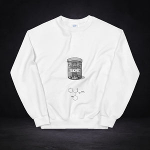 Ritalin Graphic Sweater von NiZED, Vorderansicht mit Designprint vor dunklem Betonhintergrund