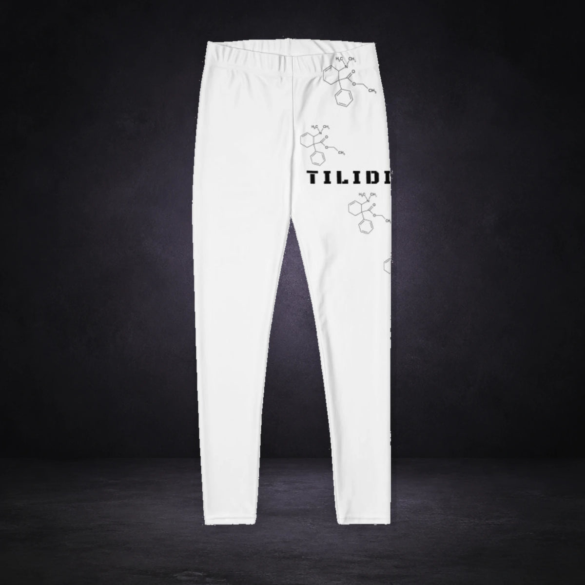 Party Chill Leggings von NiZED, Produktansicht mit Designprint vor dunklem Betonhintergrund