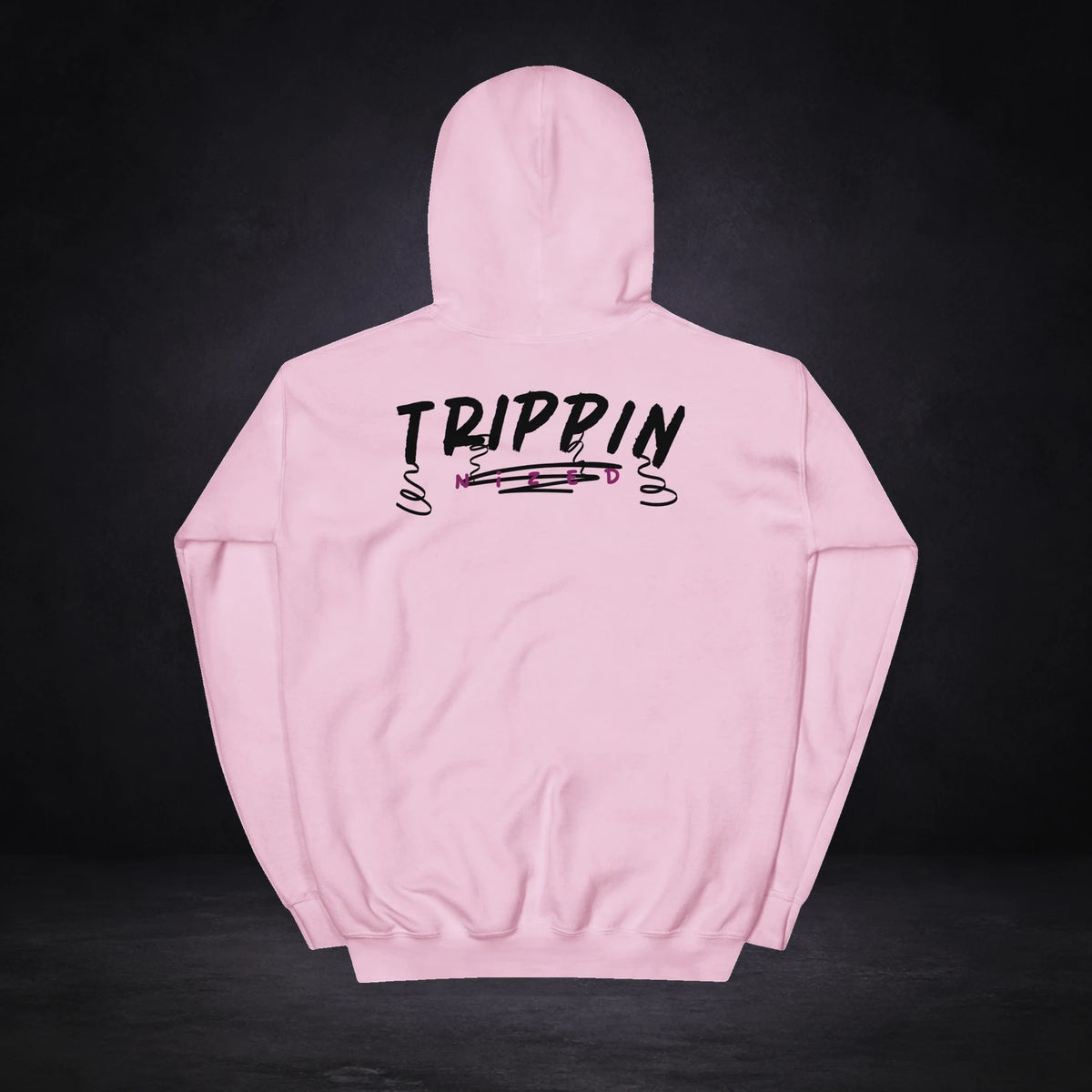 Trippin Graphic Hoodie von NiZED, Rückansicht mit Designprint vor dunklem Betonhintergrund
