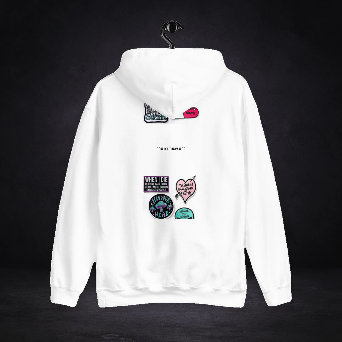 Trippy Pills Hoodie von NiZED, Rückansicht mit Designprint vor dunklem Betonhintergrund