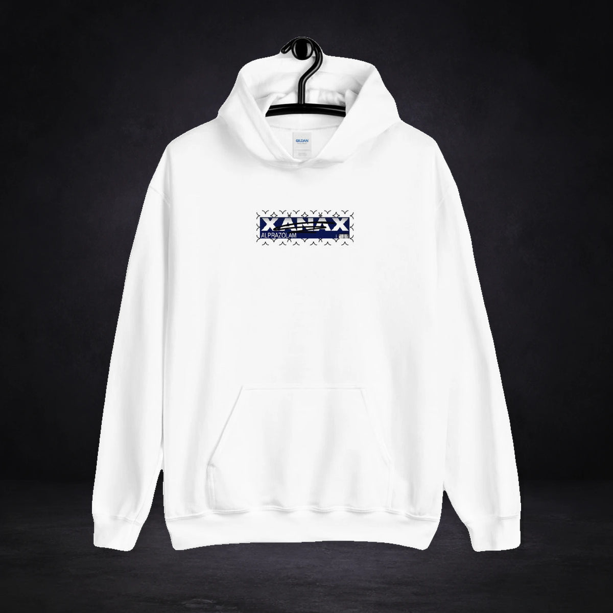 Xanax Alprazolam Hoodie von NiZED, Vorderansicht mit Designprint vor dunklem Betonhintergrund